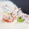 Kuscheltier Sleeping Pets Hase grau 12cm im grünen Körbchen